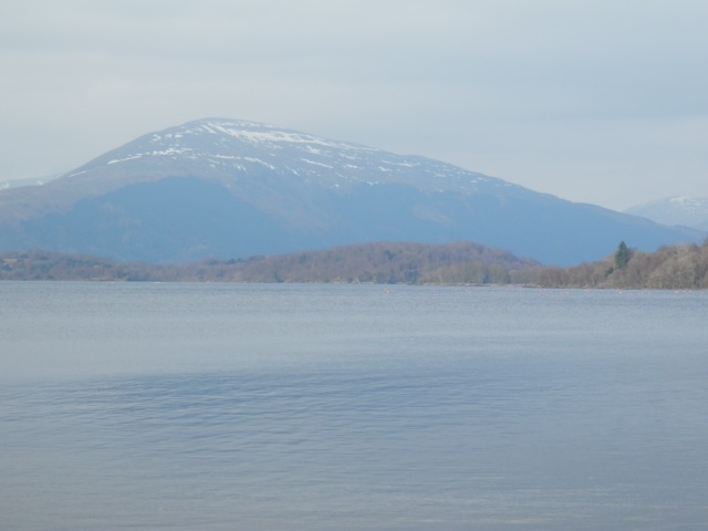 Milarrochy Bay Loch Lomond with some snow on the corbetts in the background